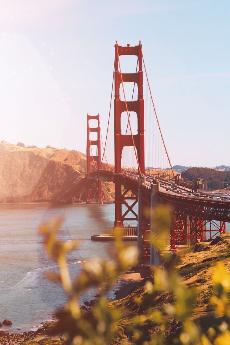 Captivating view of the iconic Golden Gate Bridge during a vibrant sunset over the bay.